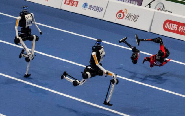 World humanoid robot games show runners breaking records, bursting into flames